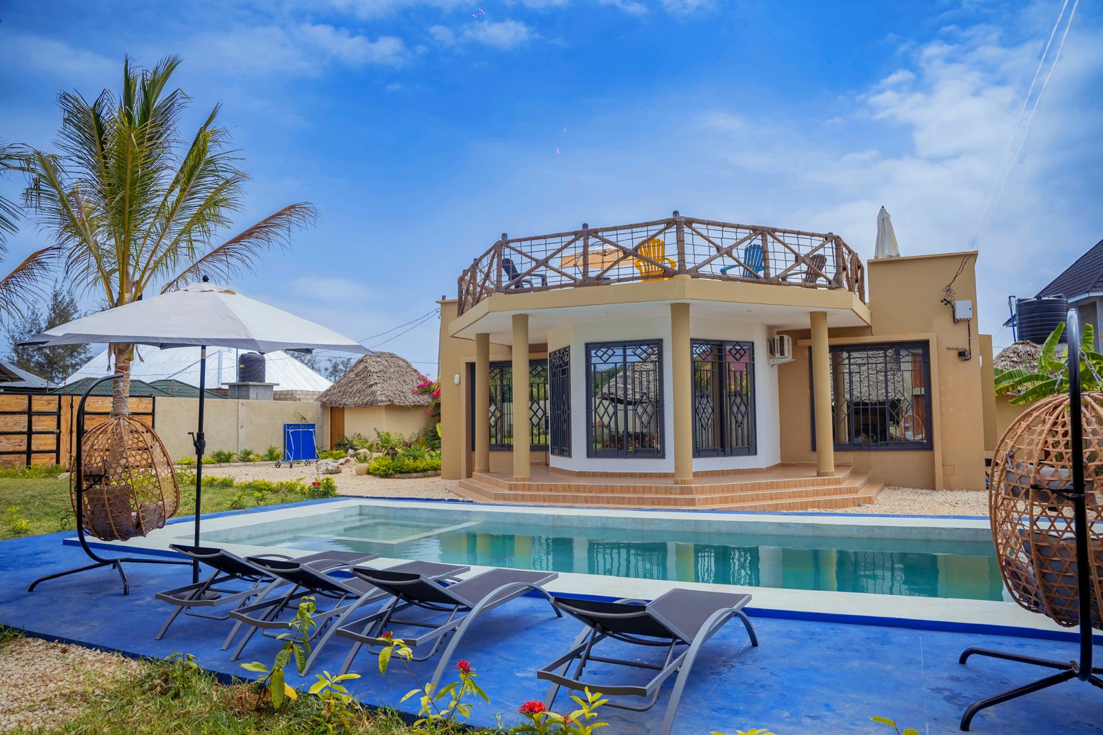 Villa privée avec piscine, transats et toit-terrasse à Kiwengwa, Zanzibar